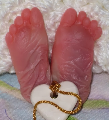 After starting the adoption process we were surprised by our first pregnancy. Although she was stillborn, Evelyn Rose, will always be a big part of our family story.