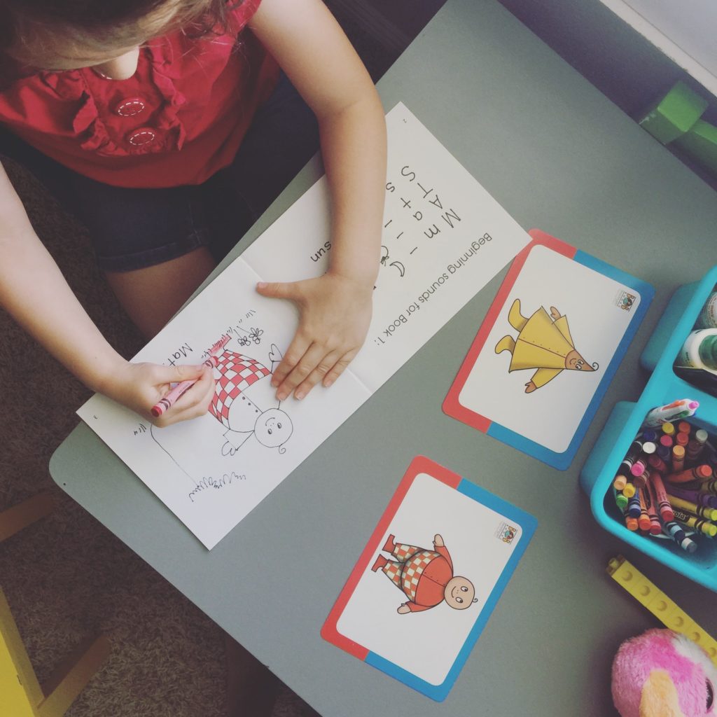 Our daily routine with three kids under five years old is full and busy! Here is what an average day looks like for us. We always find time for play with a little school and rest mixed in, lots of snacks, and happy memories. #dailyroutine #threekids #momlife #preschoolhomeschool #homeschoolroutine #learningathome #dailyschedule #kidsschedule