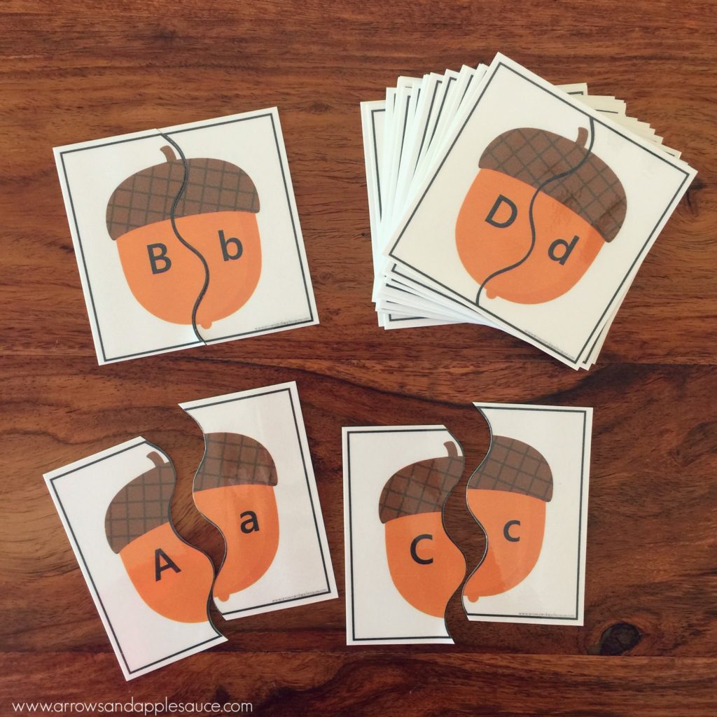 We're adding a little seasonal fun to our homeschool routine with this fun printable fall theme activity bundle. Your preschooler will love it! Practice alphabet matching, scissor skills and fine motor, counting and graphing, number sense, penmanship, and color recognition. So much educational fun in one great printable bundle! #falltheme #preschooltheme #fallpreschoolactivities #fallkidsactivities #printablefallworksheets #homeschoolprintables #alphabetgames #scissorskills #preschoolmath #numbergames #pumpkingames